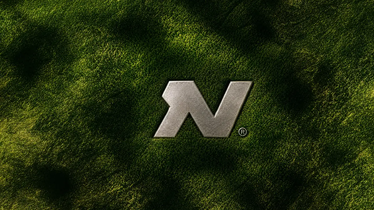 The metal NOVAQ symbol on grass